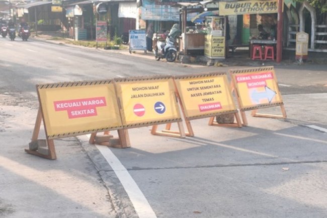 Perbaikan jembatan Temas