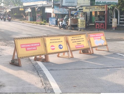 Perbaikan jembatan Temas